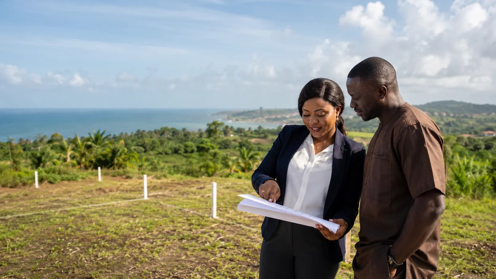 Real estate education planning session overlooking Ghana's coast